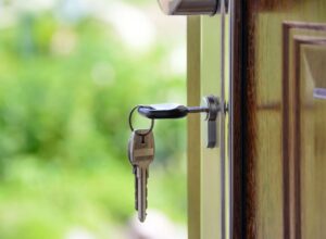 black handled key on key hole